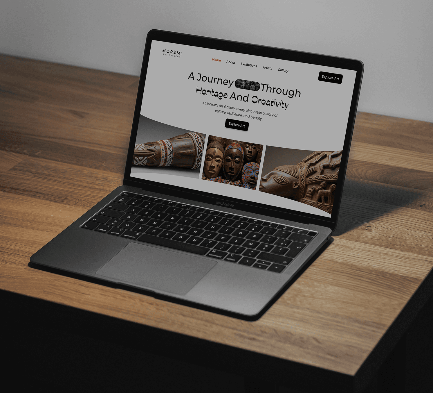 Moremi Art Gallery Website on Laptop